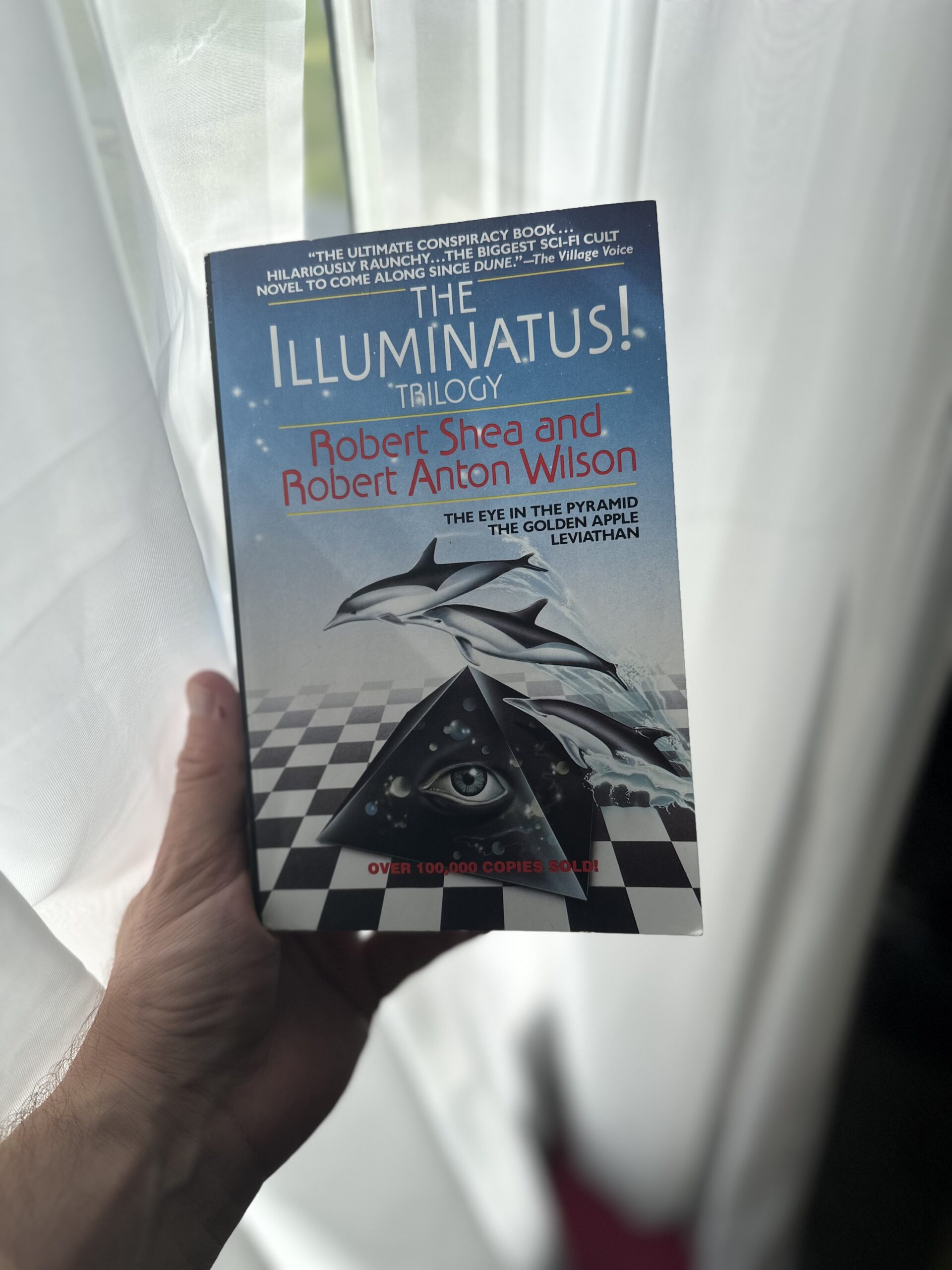 The Illuminatus! Trilogy by Robert Shea and Robert Anton Wilson